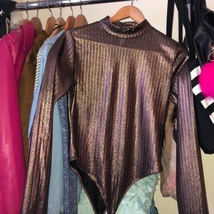 NEVER WORN. Metallic bodysuit.